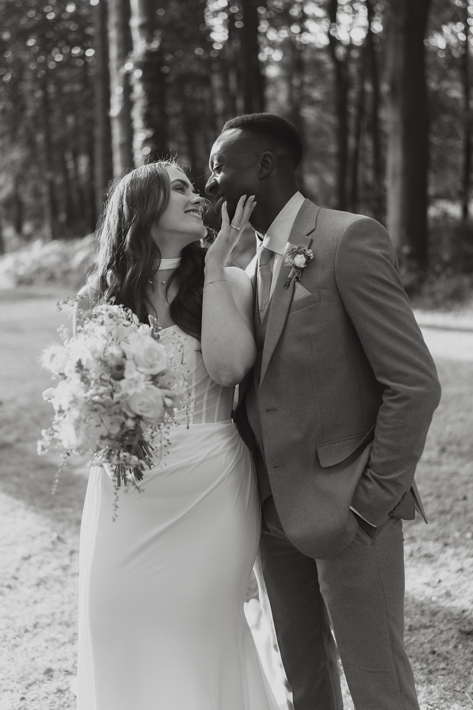 Black and white portrait of Caitlyn and Buneme on their wedding day at The Pumping House
